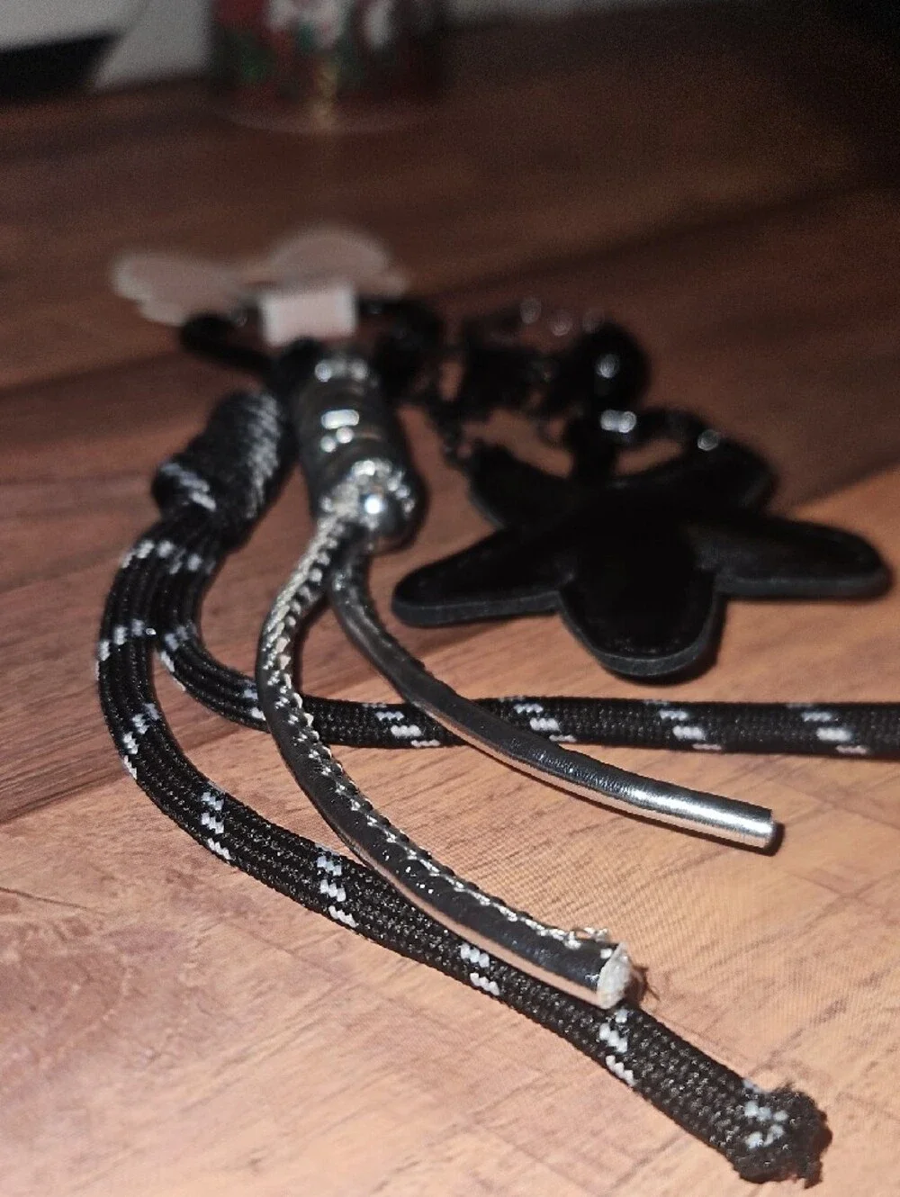 Black Star Charm Keychain with Metallic Accents